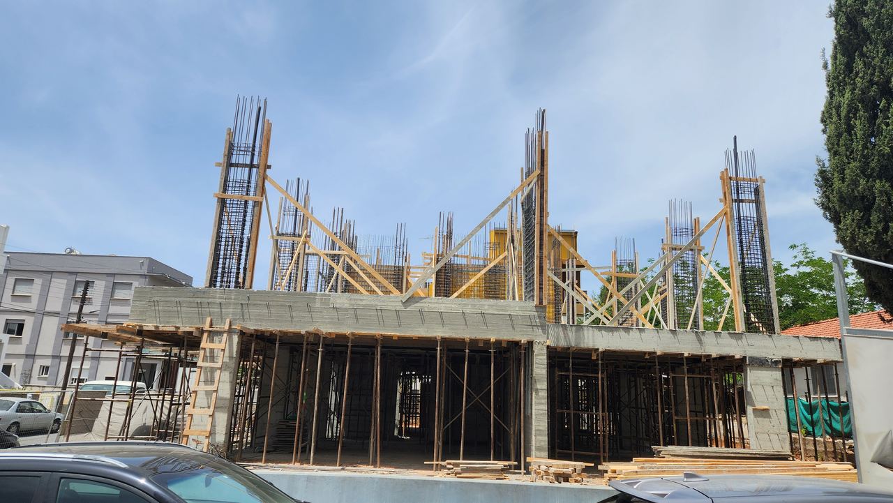 Reinforced concrete frame and timber formwork on an active building site